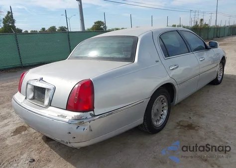 1999 Lincoln Town Car Cartier from USA, damaged, VIN 1LNHM83W3XY654925